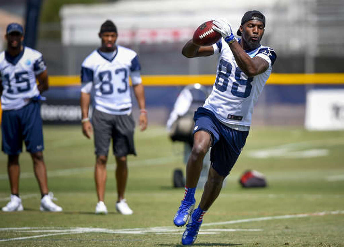 FILE - In this Aug. 2, 2016, file photo, Dallas Cowboys wide receiver Dez Bryant (88) makes a reception as part of a drill during practice at the NFL football team's training camp in Oxnard, Calif. The star wideout hasn’t played much football since the end of his All-Pro season in 2014, and he’s got the nervous energy to show it. Not only did he have a career-worst year plagued by a broken foot, he had to watch the last two meaningless losses of a 4-12 season when the Cowboys shut him down. (AP Photo/Gus Ruelas, File)