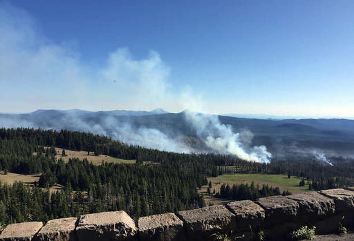 This Tuesday, Aug. 2, 2016 photo provided by Inciweb.gov shows the Bybee Creek wildfire burning near Crater Lake, Ore. The wildfire burning southwest of Crater Lake has spread to more than 700 acres, prompting an evacuation warning for some parts of Crater Lake National Park. (Inciweb.gov via AP)