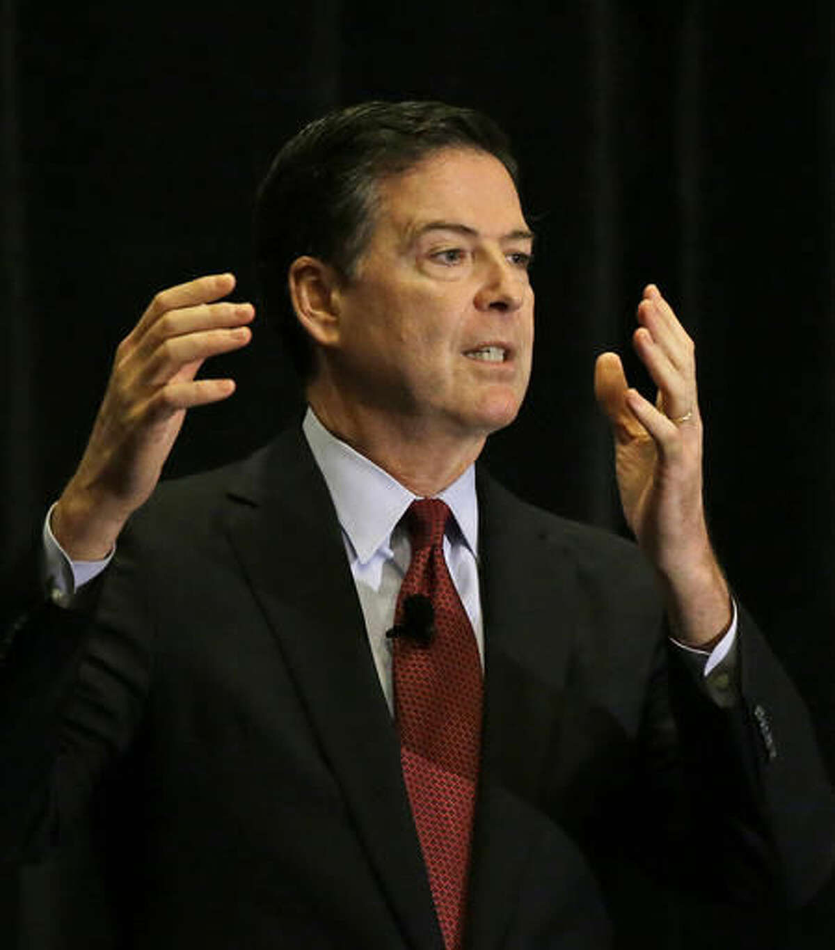 FBI Director James Comey gestures during an address to the American Bar Association annual meeting Friday, Aug. 5, 2016, in San Francisco. (AP Photo/Eric Risberg)