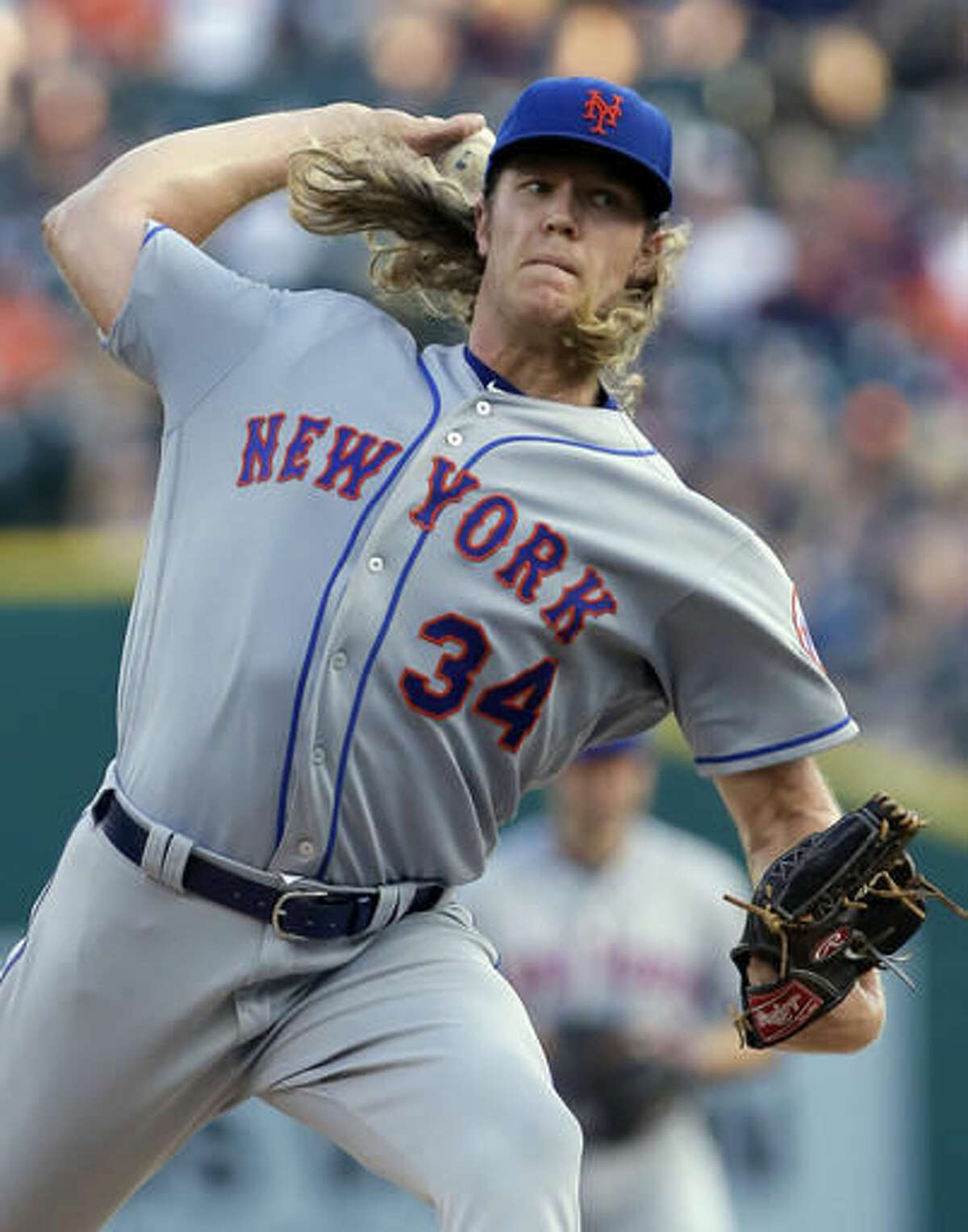 New York Mets' Noah Syndergaard pitches against the Detroit Tigers during the first inning of an interleague baseball game Friday, Aug. 5, 2016, in Detroit. (AP Photo/Duane Burleson)