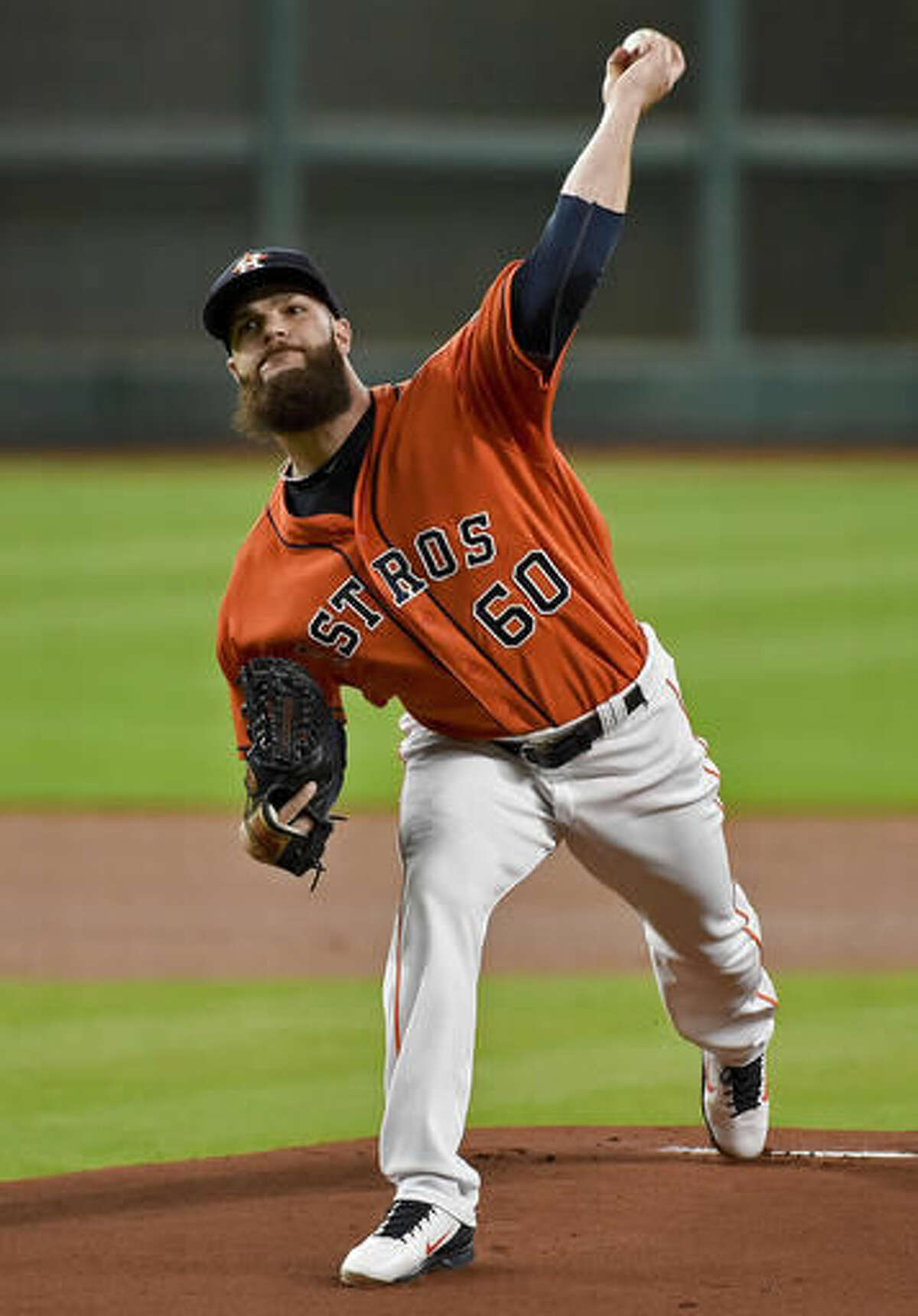 Houston Astros starting pitcher Dallas Keuchel delivers in the first inning of a baseball game against the Texas Rangers, Friday, Aug. 5, 2016, in Houston. (AP Photo/Eric Christian Smith)