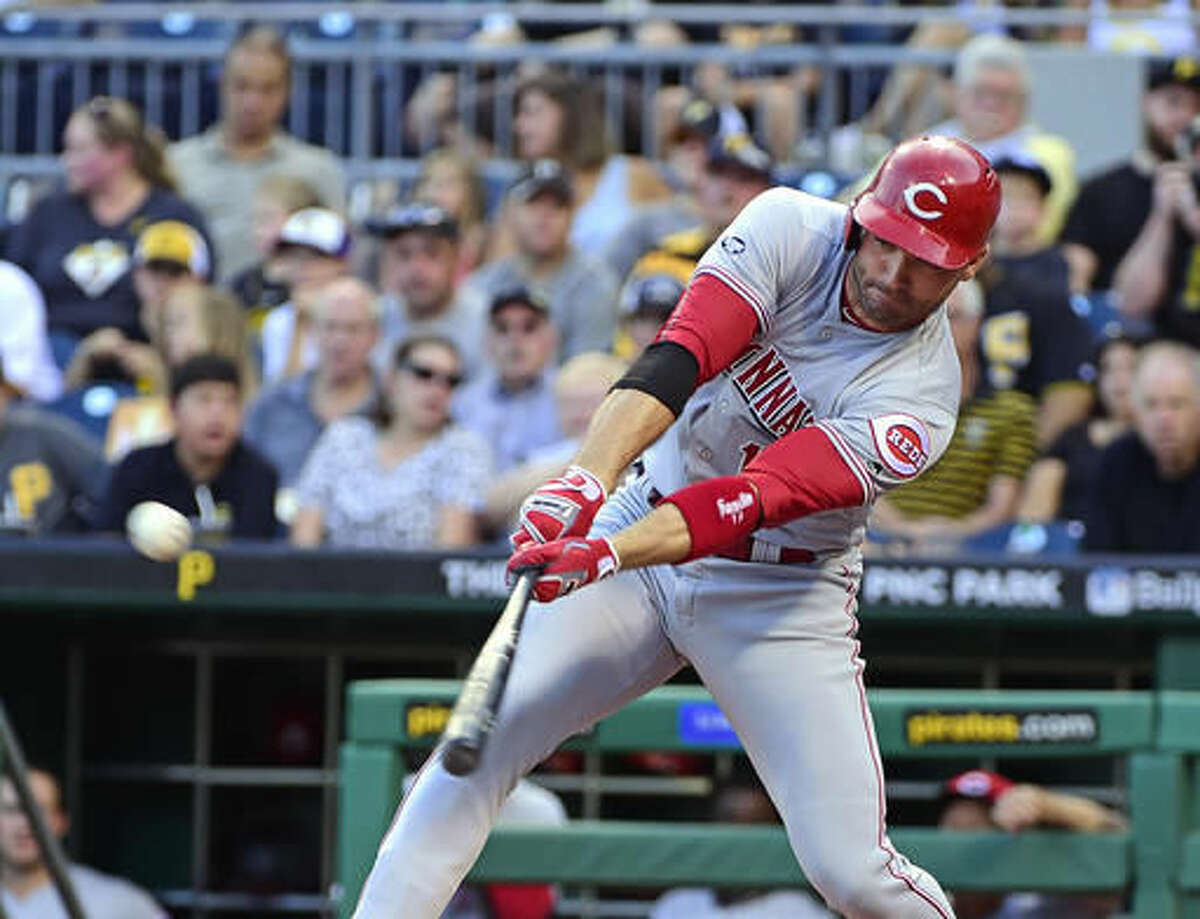 Cincinnati Reds' Joey Votto singles during the first inning of a baseball game against the Pittsburgh Pirates in Pittsburgh, Friday, Aug. 5, 2016. (AP Photo/Fred Vuich)