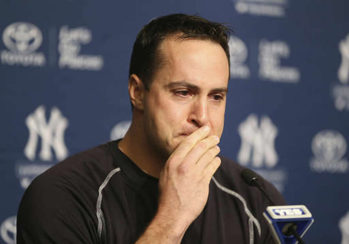 New York Yankees baseball player Mark Teixeira becomes emotional while talking to reporters at a press conference before a game against the Cleveland Indians at Yankee Stadium in New York, Friday, Aug. 5, 2016. Teixeira announced his plans to retire at the end of the season. (AP Photo/Seth Wenig)