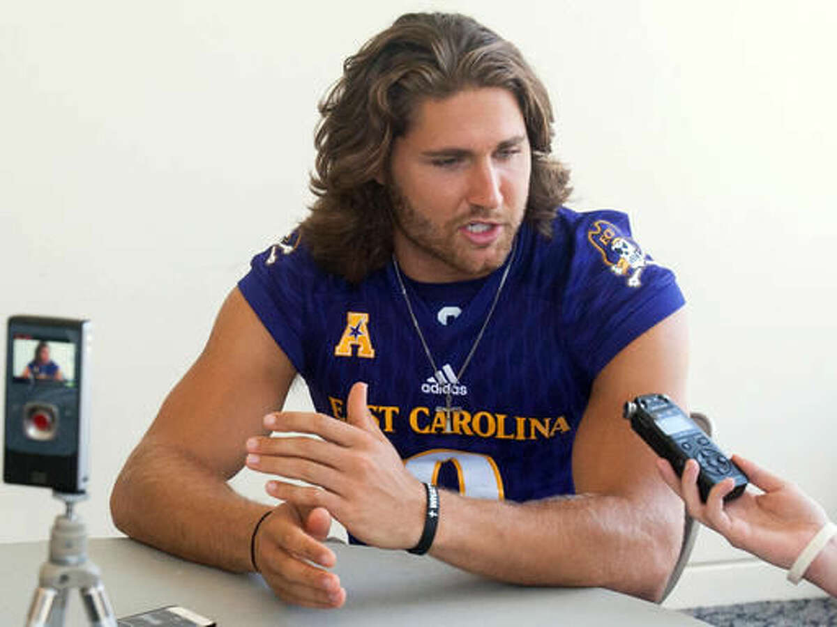 East Carolina University's Philip Nelson (9) answers questions about the upcoming football season during media day in Greenville, N.C., Saturday, Aug. 6, 2016. Nelson is out to make the most of his second chance at East Carolina. The 22-year-old former starter at Minnesota is looking to continue to redeem himself with the Pirates, more than two years after he was involved in a nightclub fight that left a former college football player with a serious brain injury and led to his dismissal from the Rutgers team. (Abbey Mercando /The Daily Reflector via AP)