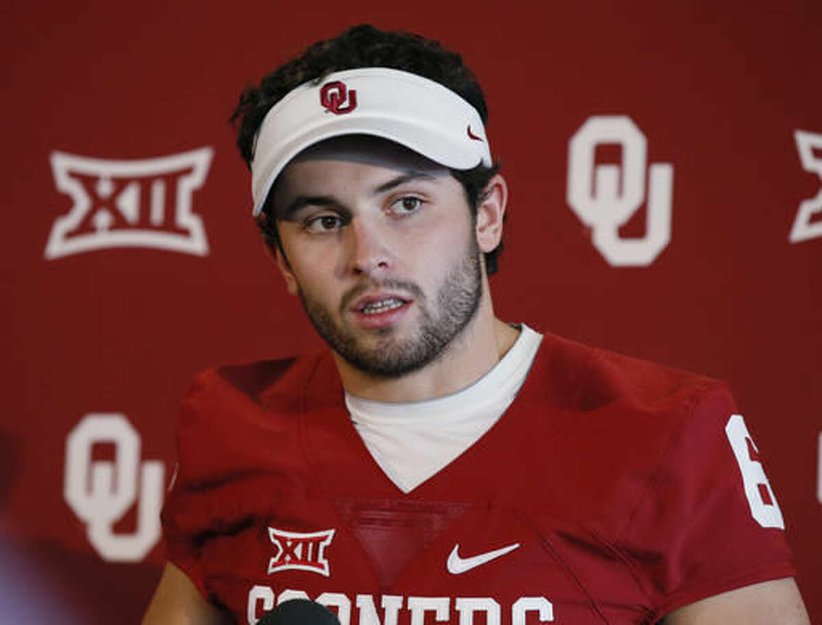 Oklahoma starting quarterback Baker Mayfield talks to the media during an NCAA college football media day in Norman, Okla., Saturday, Aug. 6, 2016. The Oklahoma Sooners, fresh off an appearance in the College Football Playoff, believe a return trip is a legitimate possibility. (AP Photo/Sue Ogrocki)