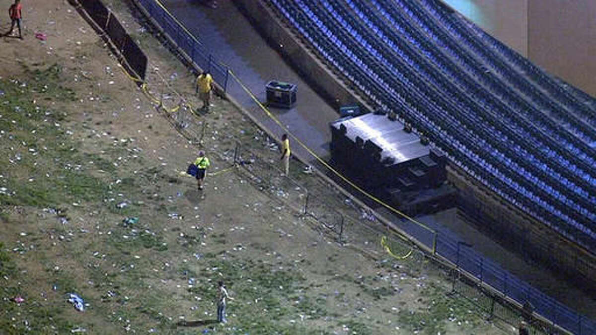 This photo provided by NBC10 shows caution tape placed across a gap in railing after a concert by Snoop Dogg and Wiz Khalifa at the BB&T Pavilion in Camden, N.J., Friday, Aug. 5, 2016. Authorities say multiple people have been hurt after the railing collapsed during the concert. (NBC10 via AP) PHILADELPHIA OUT; MANDATORY CREDIT