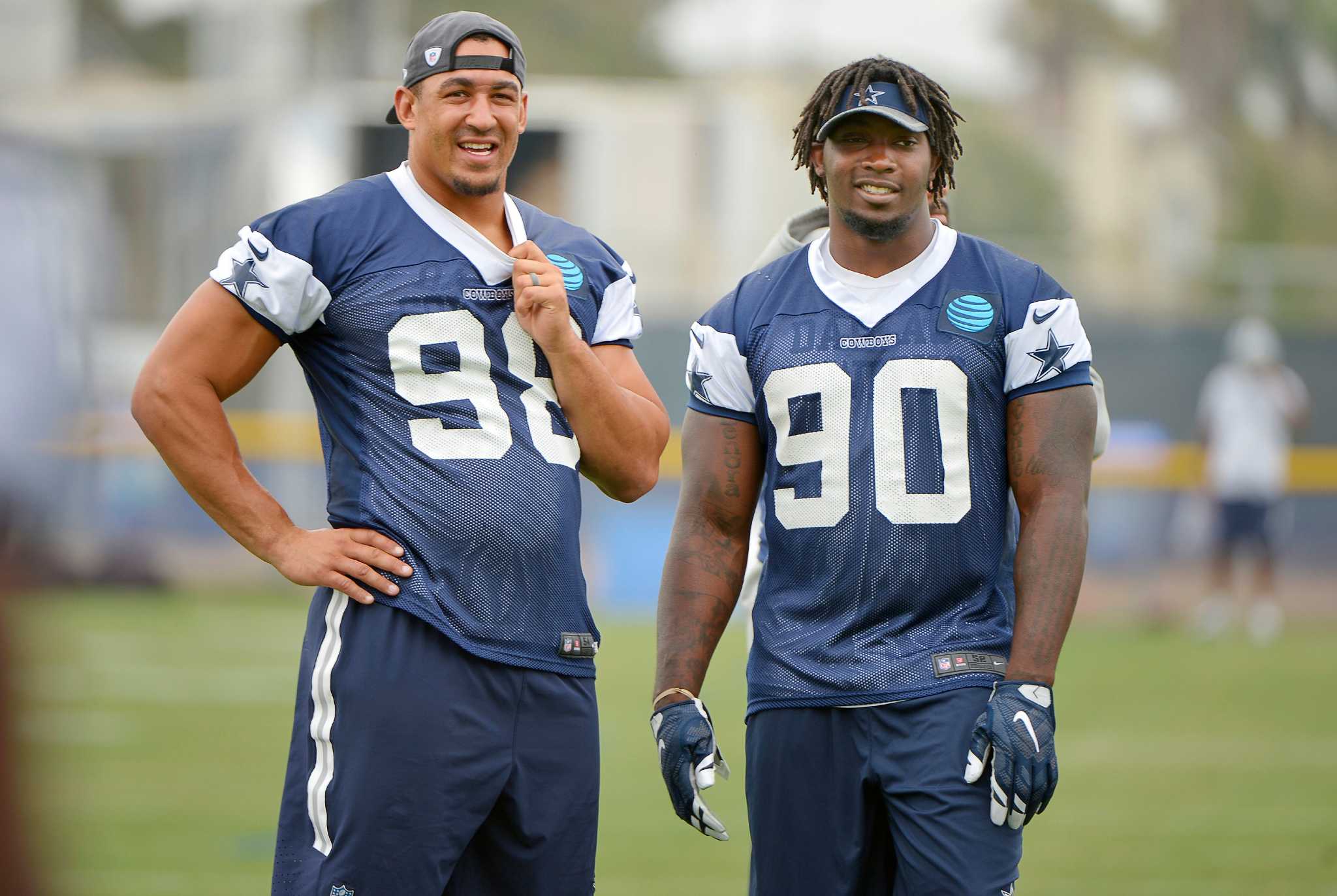 Dallas Cowboys defensive end DeMarcus Lawrence (90) warms up