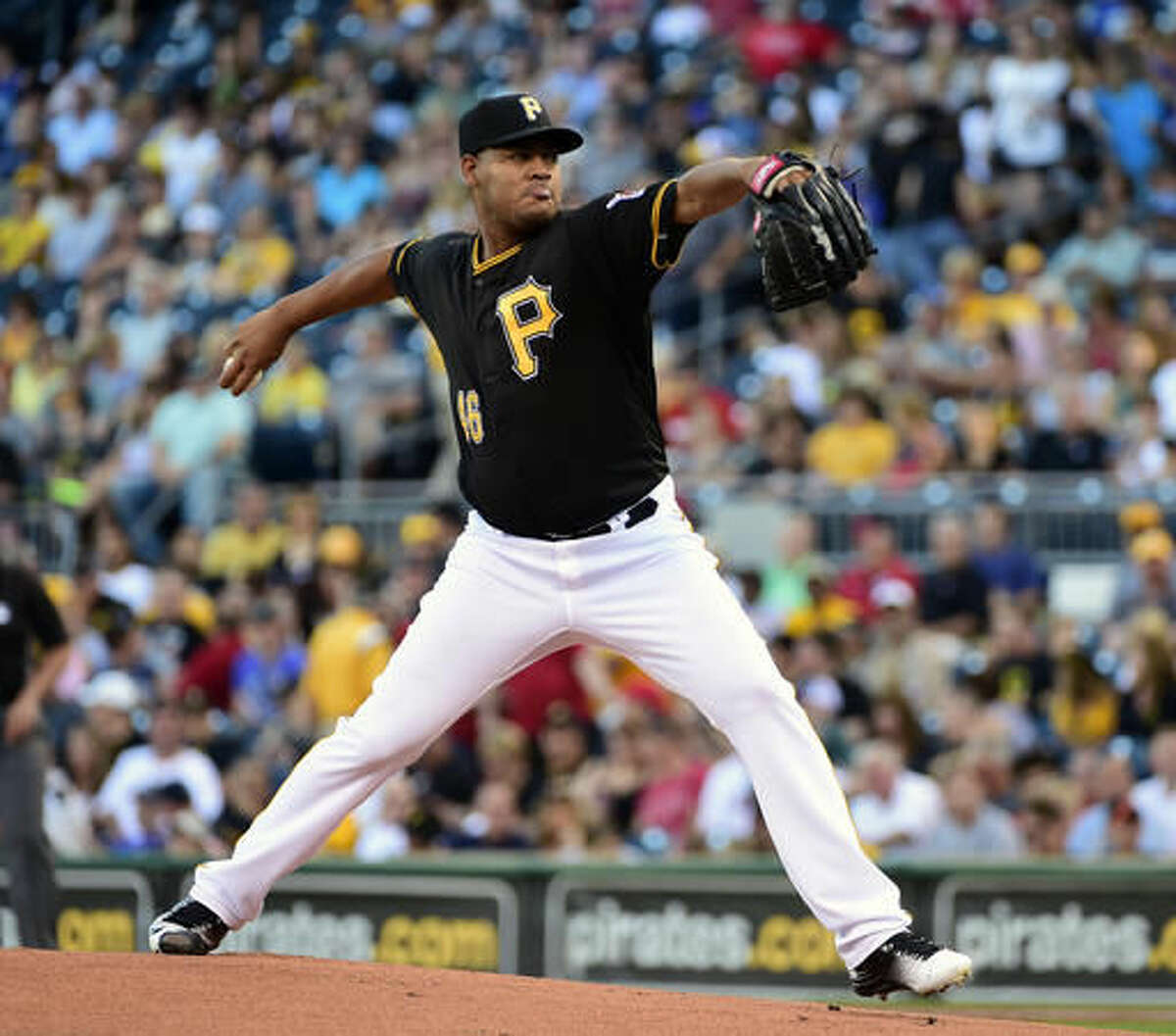 Pittsburgh Pirates starting pitcher Ivan Nova (46) throws in the first inning of a baseball game against the Cincinnati Reds in Pittsburgh, Saturday, Aug. 6, 2016. (AP Photo/Fred Vuich)