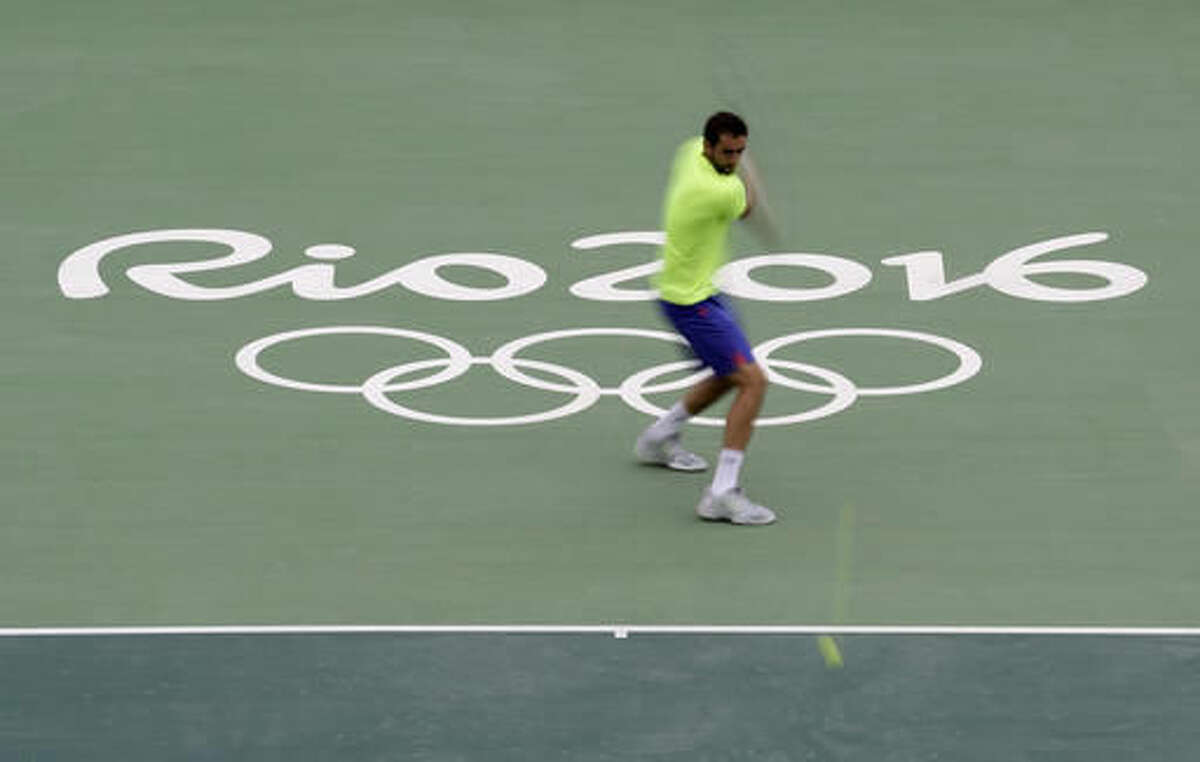 Croatia's Marin Cilic practices during a training session at the Olympic Tennis Center at the Olympic park in Rio de Janeiro, Brazil, Wednesday, Aug. 3, 2016. The Summer 2016 Olympics is scheduled to open Aug. 5. (AP Photo/Charlie Riedel)