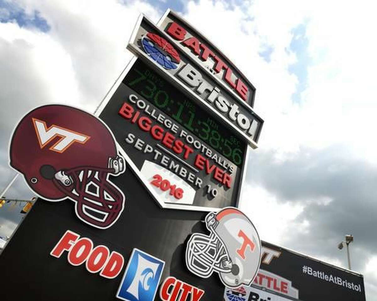 FILE - In this Sept. 10, 2016, file photo, a countdown clock is unveiled for the Battle of Bristol in Bristol, Tenn. With so many high-profile intersectional matchups on neutral sites, the Southeastern Conference’s opening-week schedule bears a striking resemblance to a bowl lineup. The trend continues Sept. 10 when Tennessee faces Virginia Tech at Bristol Motor Speedway. (AP Photo/The Bristol Herald-Courier, David Crigger, File)