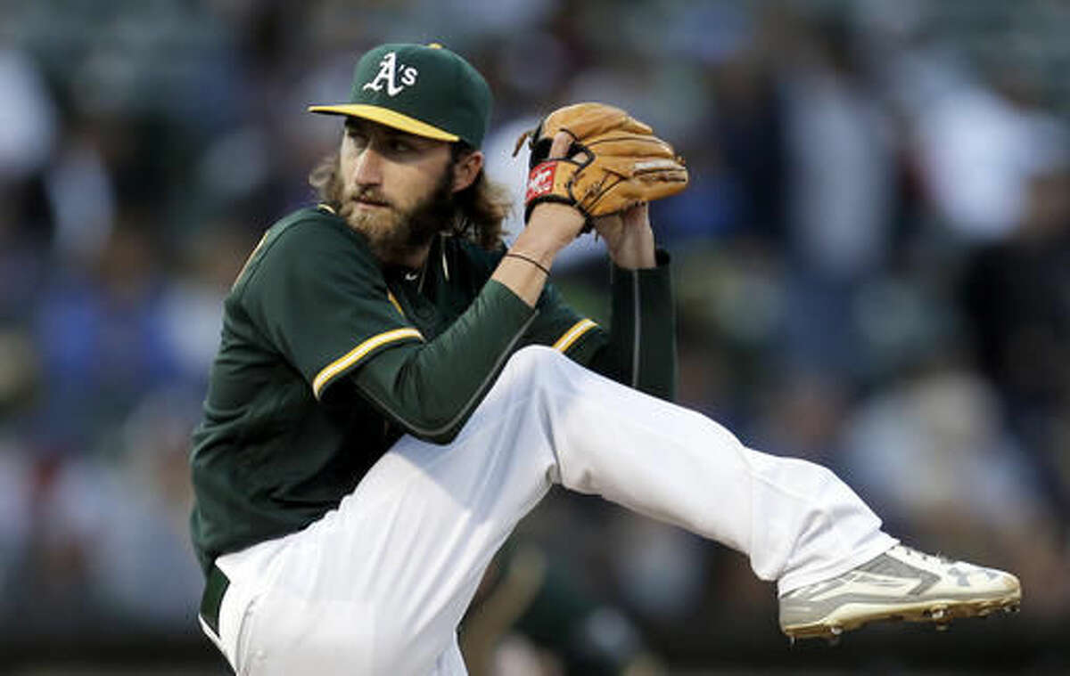 Oakland Athletics pitcher Dillon Overton works against the Chicago Cubs during the first inning of a baseball game Friday, Aug. 5, 2016, in Oakland, Calif. (AP Photo/Ben Margot)