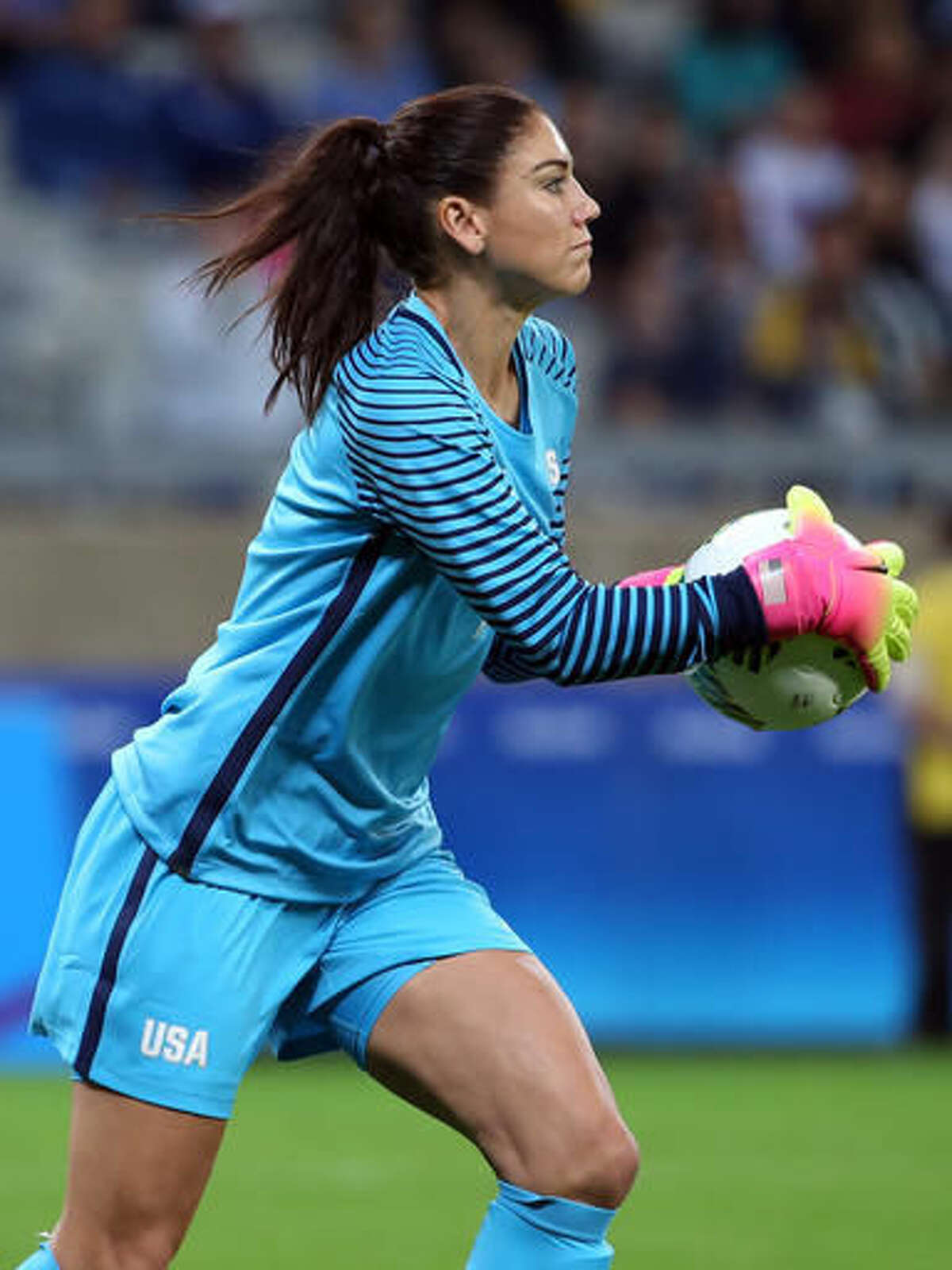 United States goalkeeper Hope Solo holds the ball during a women's Olympic football tournament match against New Zealand at the Mineirao stadium in Belo Horizonte, Brazil, Wednesday, Aug. 3, 2016. Solo says she was not bothered by fans who chanted "Zika, Zika" at her as the U.S. women's soccer team defeated New Zealand in its Olympic debut on Wednesday. The crowd jeered the goalkeeper with the reference to the virus that has scared many athletes ahead of the Rio Games.(AP Photo/Eugenio Savio)