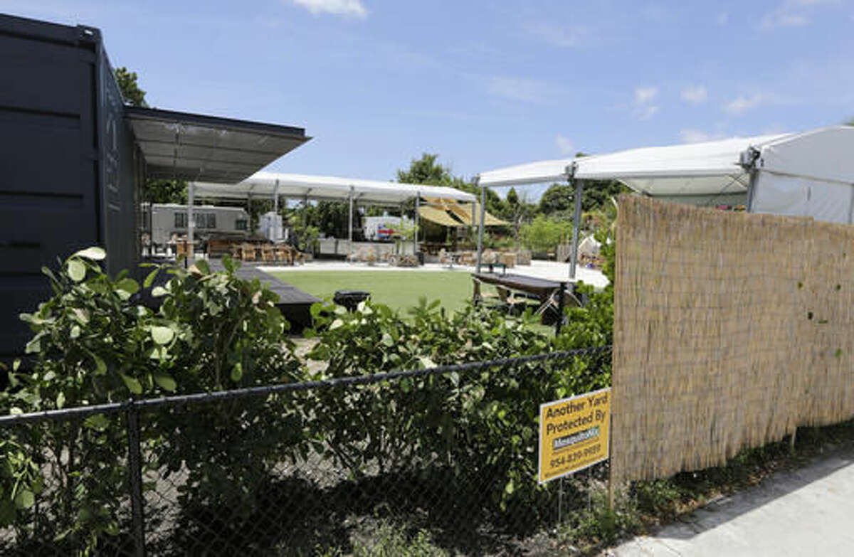A view of the outdoor business The Wynwood Yard that has been closed since last Aug. 2, due to the cases of Zika in the area, Friday, Aug. 5, 2016, in the Wynwood area of Miami. Thank goodness it's the slow season in Florida. At least that's what officials and representatives of the state's $82 billion tourism industry are thinking in the wake of news that 15 people were infected with Zika in one small, trendy neighborhood in Miami. (AP Photo/Alan Diaz)