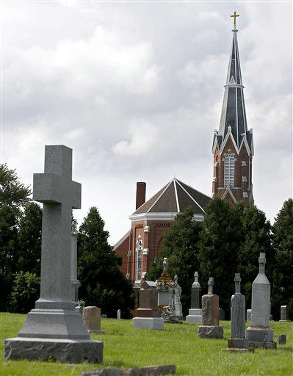 FOR RELEASE SATURDAY, AUGUST 6, 2016, AT 12:01 A.M. CDT.- In this photo from Monday, Aug. 1, 2016, St. Clements Church in Bankston, Iowa, is one of many that shares a pastor with other parishes. (Dave Kettering/Telegraph Herald via AP)