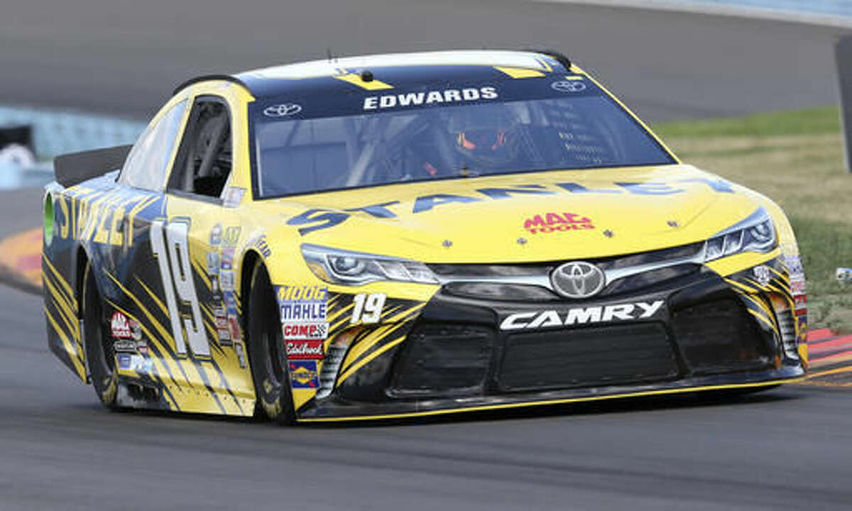 Carl Edwards (19) drives during qualifying for Sunday's NASCAR Sprint Cup Series auto race at Watkins Glen International, Saturday, Aug. 6, 2016, in Watkins Glen, N.Y. Edwards won the pole for Sunday's race. (AP Photo/Mel Evans)