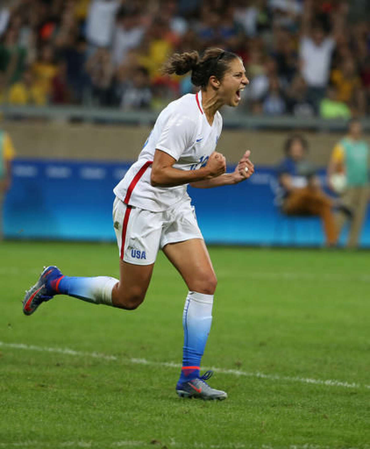 United States's Carli Lloyd, celebrates her goal during a group G match of the women's Olympic football tournament between United States and France at the Mineirao stadium in Belo Horizonte, Brazil, Saturday, Aug. 6, 2016. (AP Photo/Eugenio Savio)