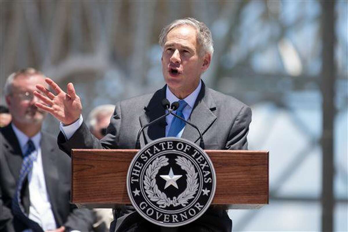 Texas Gov. Greg Abbott speaks during the groundbreaking ceremony for the Harbor Bridge replacement project at the Ortiz Center in Corpus Christi, Texas, Monday, Aug. 8, 2016. Abbott made his first public appearance since being hospitalized last month with severe burns. He attended the groundbreaking of a nearly $900 million new harbor bridge in Corpus Christi. (Courtney Sacco/Corpus Christi Caller-Times via AP)