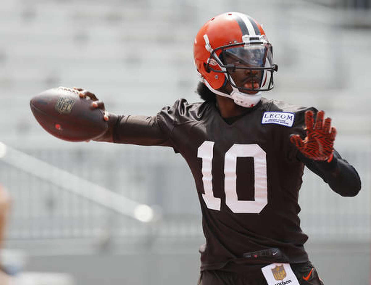 Cleveland Browns quarterback Robert Griffin III drops back to pass during their orange and brown scrimmage at the NFL football team's training camp Saturday, Aug. 6, 2016, in Columbus, Ohio. (AP Photo/Jay LaPrete)