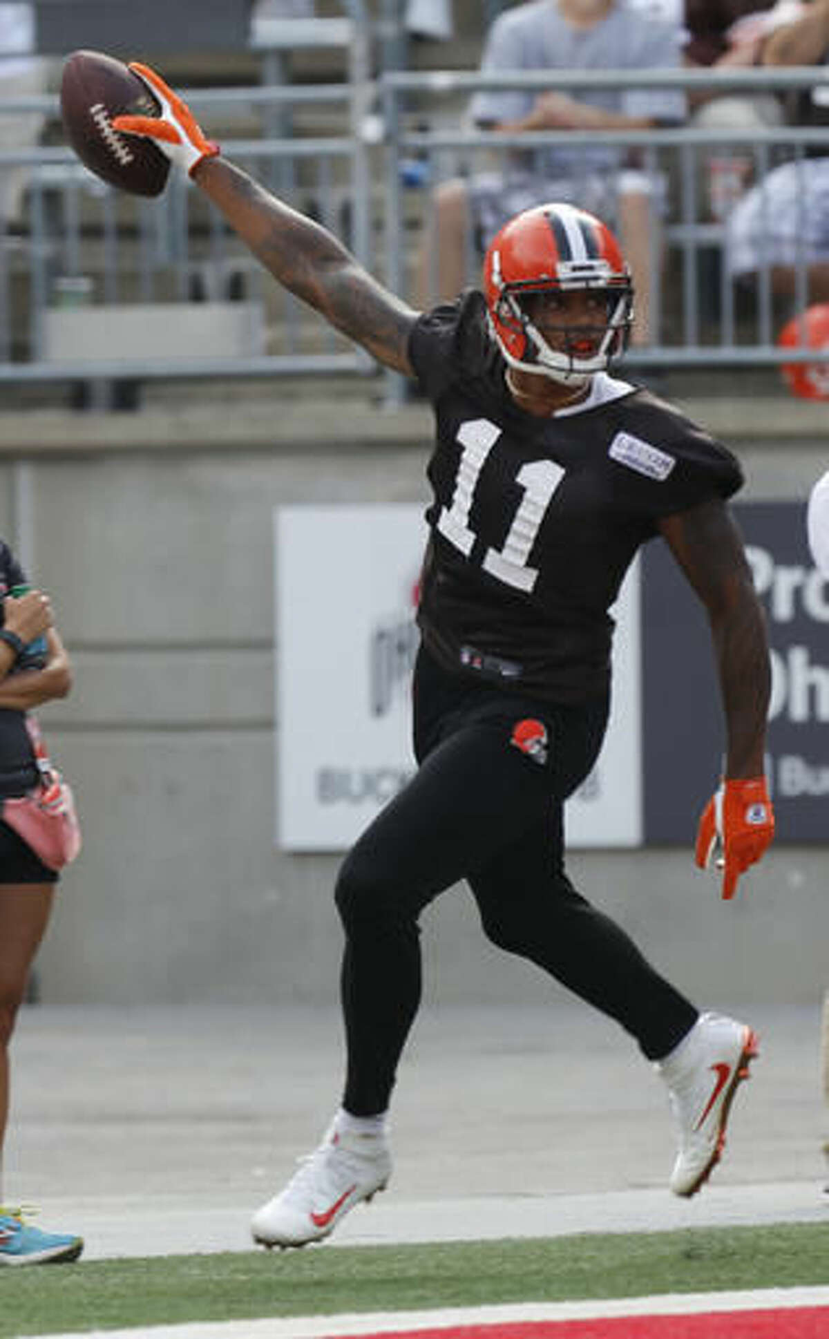 Cleveland Browns wide receiver Terrelle Pryor celebrates scoring a touchdown during their orange and brown scrimmage at the NFL football team's training camp Saturday, Aug. 6, 2016, in Columbus, Ohio. (AP Photo/Jay LaPrete)