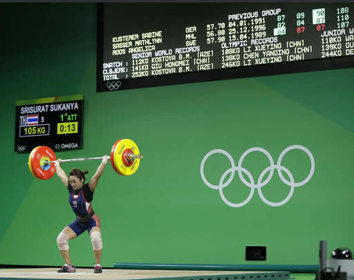 Sukanya Srisurat, of Thailand, competes in the women's 58kg weightlifting competition at the 2016 Summer Olympics in Rio de Janeiro, Brazil, Monday, Aug. 8, 2016. (AP Photo/Mike Groll)