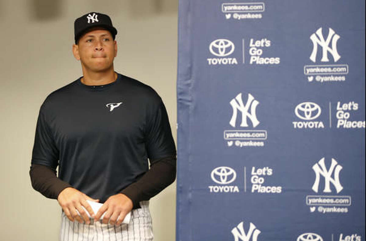 New York Yankees designated hitter Alex Rodriguez walks into a news conference, Sunday, Aug. 7, 2016, in New York, before announcing that Friday, Aug. 12, will be his last game as a player. Since Rodriguez made the announcement, his value has suddenly soared, at least when it comes to ticket prices. Despite a .204 batting average this season, baseball fans are suddenly willing to pay four times the normal price to see A-Rod play the Tampa Bay Rays on Friday. (AP Photo/Kathy Willens)
