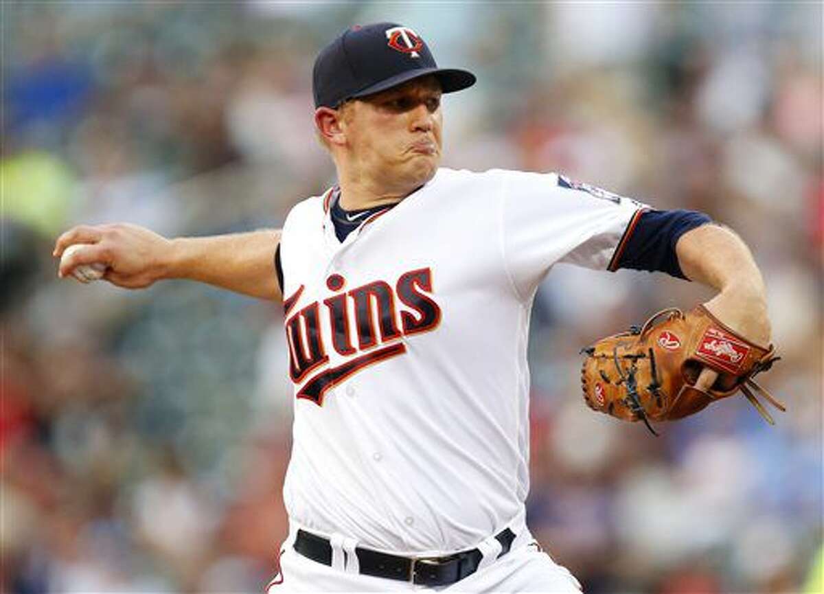 Minnesota Twins starting pitcher Tyler Duffy throws to the Houston Astros in the first inning during a baseball game on Monday, Aug., 8, 2016 in Minneapolis. (AP Photo/Andy Clayton-King)