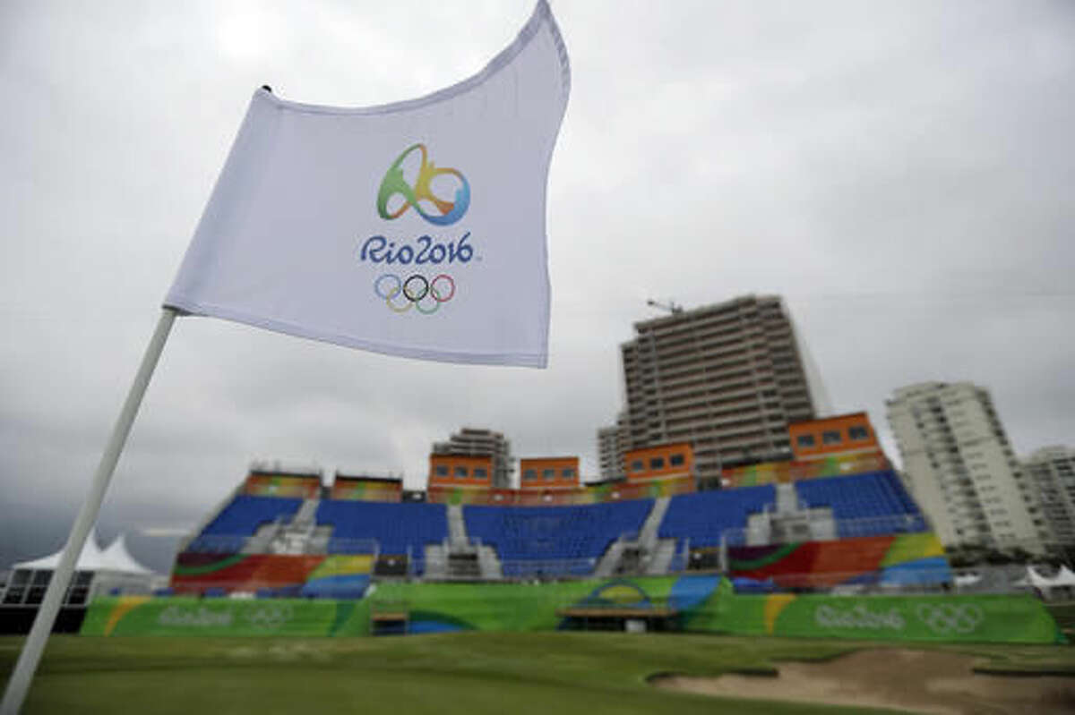 The flag on the 18th hole waves in the wind on the Olympic golf course at the 2016 Summer Olympics in Rio de Janeiro, Brazil, Sunday, Aug. 7, 2016. (AP Photo/Robert F. Bukaty)