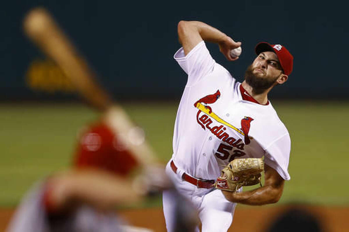 St. Louis Cardinals starting pitcher Michael Wacha throws to a Cincinnati Reds batter during the fourth inning of a baseball game, Monday, Aug. 8, 2016, in St. Louis. (AP Photo/Billy Hurst)