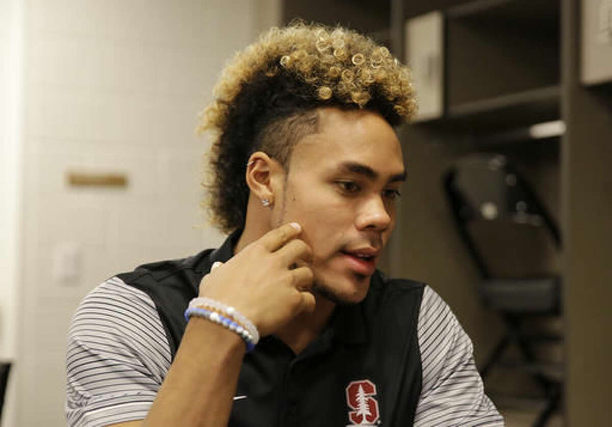 FILE - In this Thursday, July 28, 2016 file photo, Stanford wide receiver Michael Rector answers questions during the annual Bay Area college football media day at Levi's Stadium in Santa Clara, Calif. Stanford opened fall practice Monday, Aug. 8, 2016, with hopes of doing more than winning a fourth conference title in the past five seasons. (AP Photo/Eric Risberg, File)