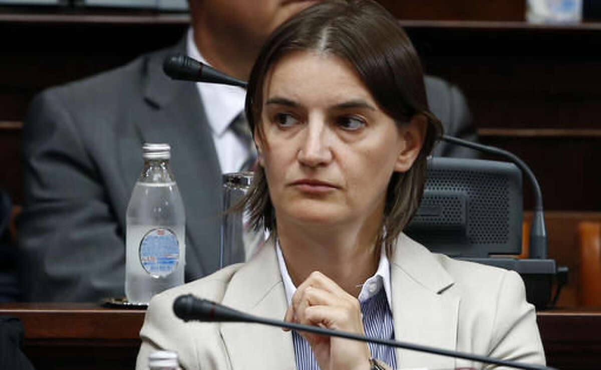 Serbian future Public Administration Minister Ana Brnabic gestures during the parliament session in Belgrade, Serbia, Tuesday, Aug. 9, 2016. Serbia's prime minister-designate Aleksandar Vucic said that his new government will include new Public Administration Minister Ana Brnabic who does not hide her sexual orientation. (AP Photo/Darko Vojinovic)