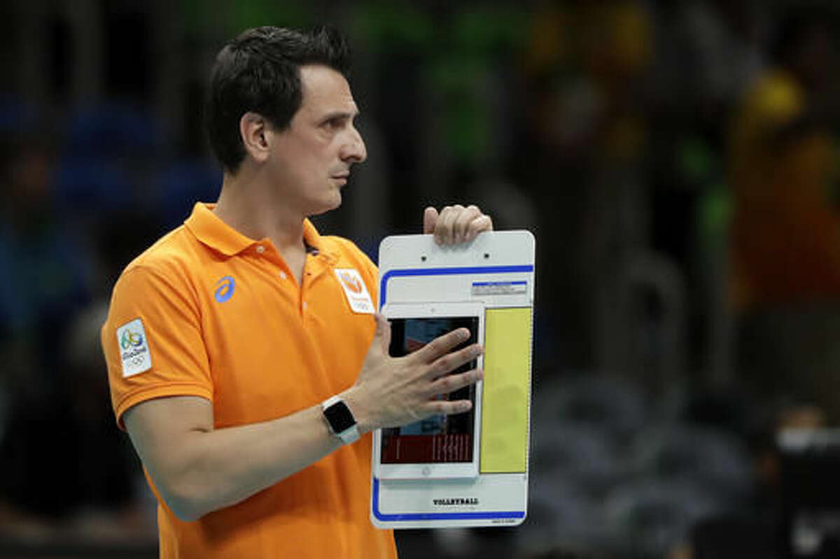 Netherlands head coach Giovanni Guidetti follows the action during a women's preliminary volleyball match against the United States at the 2016 Summer Olympics in Rio de Janeiro, Brazil, Monday, Aug. 8, 2016. (AP Photo/Matt Rourke)