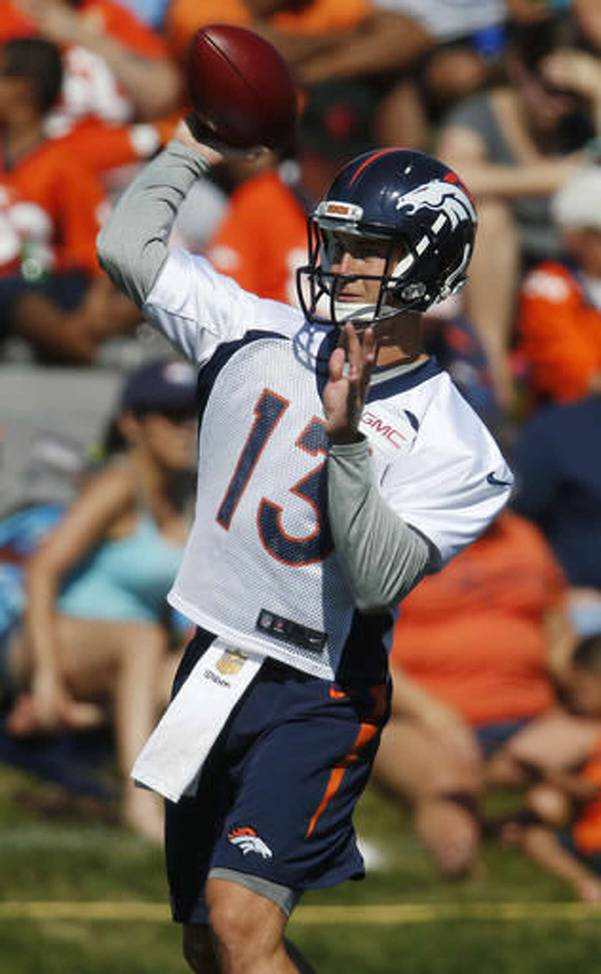 Denver Broncos quarterback Trevor Siemian takes part in drills during the team's NFL football practice Monday, Aug. 8, 2016 in Englewood, Colo. (AP Photo/David Zalubowski)
