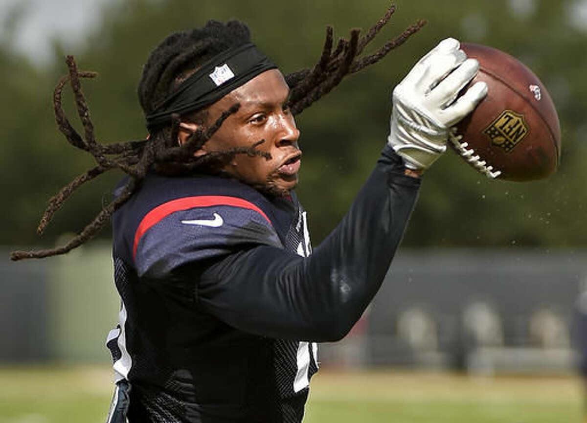 Houston Texans wide receiver DeAndre Hopkins catches a pass during a practice at the NFL football team's training camp, Saturday, Aug. 6, 2016, in Houston. (AP Photo/Eric Christian Smith)