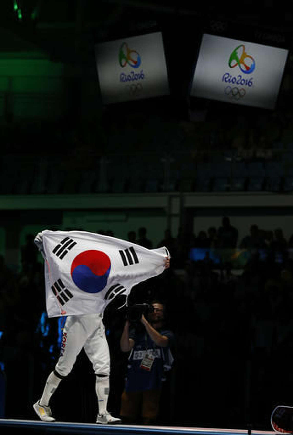 Park Sang-young from South Korea celebrate after defeated Geza Imre from Hungary in the men's epee individual fencing event at the 2016 Summer Olympics in Rio de Janeiro, Brazil, Tuesday, Aug. 9, 2016. (AP Photo/Vincent Thian)