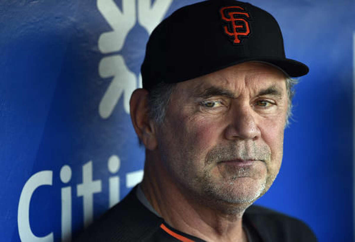 This Aug. 2, 2016 photo shows San Francisco Giants manager Bruce Bochy in the dugout prior to a baseball game against the Philadelphia Phillies in Philadelphia. Bochy has been admitted to a Miami hospital after falling ill and will miss the game against the Marlins on Monday, Aug. 8, 2016. (AP Photo/Derik Hamilton)
