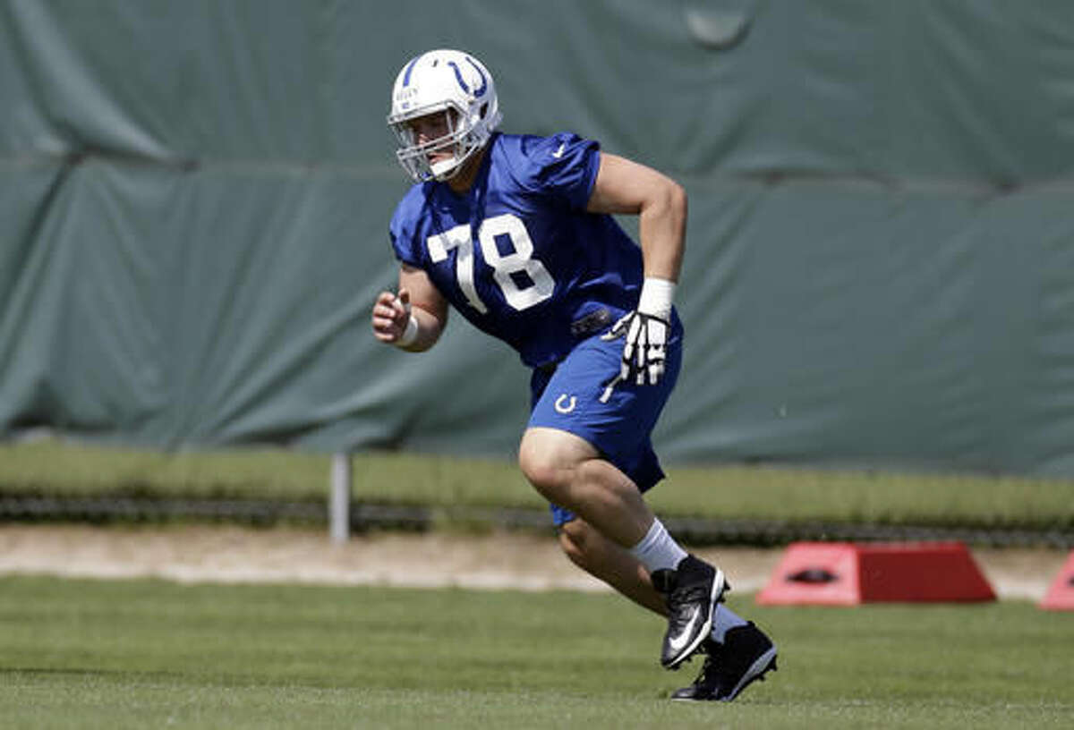 FILE - In this May 24, 2016, file photo, Indianapolis Colts center Ryan Kelly runs a drill during NFL football practice at the team's training facility in Indianapolis. Kelly is among several first-round picks, not including quarterbacks, that are intriguing potential impact players for their new teams. (AP Photo/Michael Conroy, File)