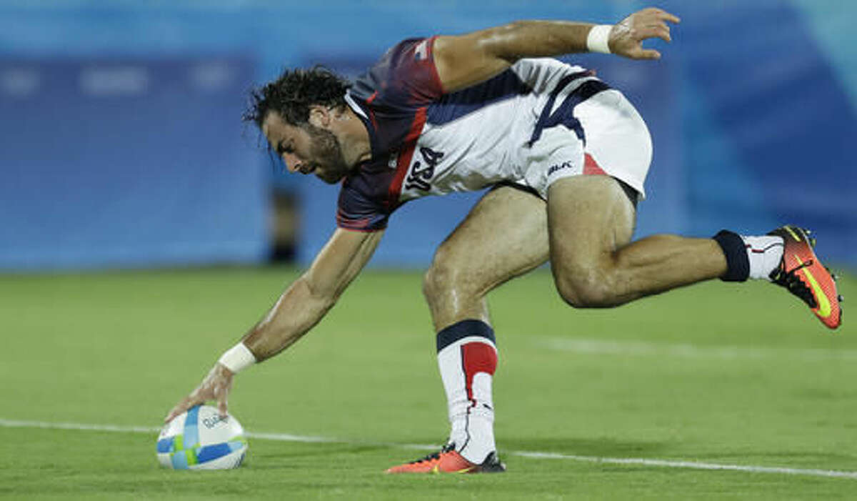 United States's Nate Ebner, scores a try during the men's rugby sevens match against Brazil at the Summer Olympics in Rio de Janeiro, Brazil, Tuesday, Aug. 9, 2016. (AP Photo/Themba Hadebe)