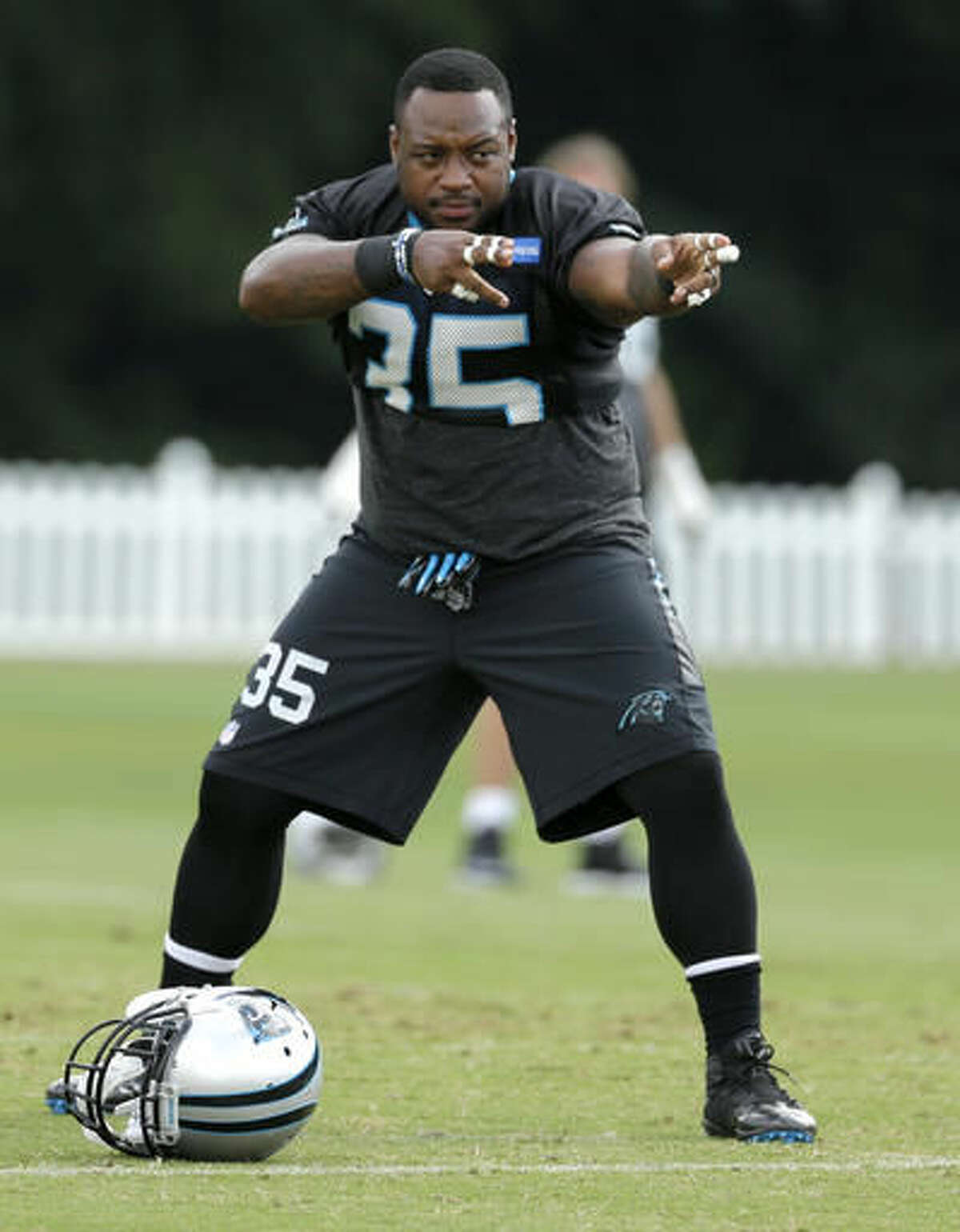 Carolina Panthers' Mike Tolbert fires up the team during an NFL training camp practice in Spartanburg, S.C., Tuesday, Aug. 9, 2016. NFL teams seem to migrating away from using the traditional fullback. Seven teams don't even have one listed on their roster. But for the NFC champion Panthers Mike Tolbert remains an effective _ and needed _ part of their offense. (AP Photo/Chuck Burton)