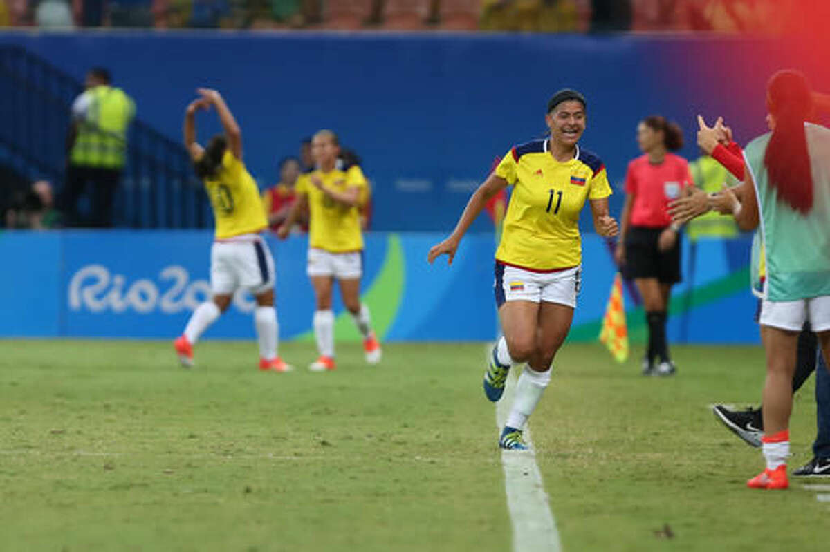 Colombia's Catalina Usme, 11, celebrates scoring her side's first goal during a group G match of the women's Olympic football tournament between Colombia and United States at the Arena Amazonia stadium in Manaus, Brazil, Tuesday, Aug. 9, 2016. (AP Photo/Michael Dantas)