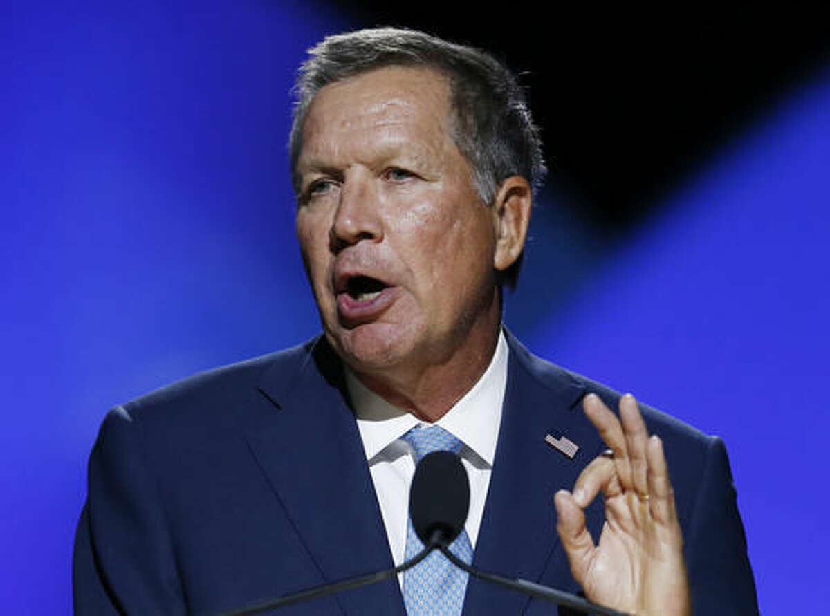 FILE - In a Sunday, July 17, 2016 file photo, Ohio Gov. John Kasich addresses the 2016 National Convention of the NAACP, in Cincinnati. Kasich says he has no idea how he'll vote come November because he doesn't support Donald Trump or Hillary Clinton. He also says he isn't sure whether Trump can win Ohio if he remains so divisive. (AP Photo/Gary Landers, File)