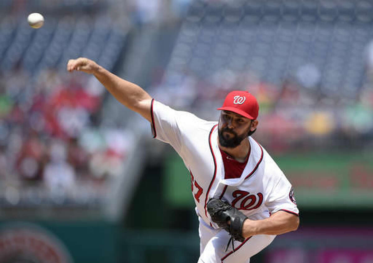 Washington Nationals starting pitcher Tanner Roark (57) delivers during the first inning of a baseball game against the San Francisco Giants, Sunday, Aug. 7, 2016, in Washington. (AP Photo/Nick Wass)