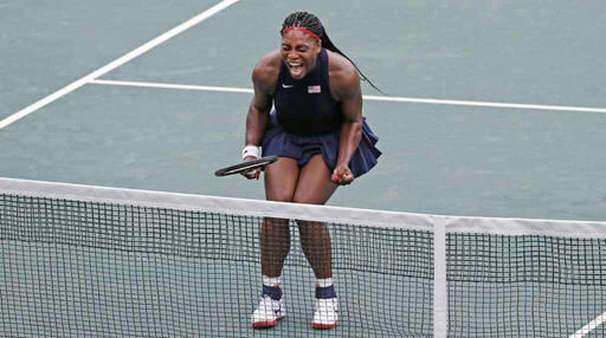 Serena Williams, of the United States, yells after winning a point at the net during the second set of her match against Daria Gavrilova, of Australia, at the 2016 Summer Olympics in Rio de Janeiro, Brazil, Sunday, Aug. 7, 2016. Williams defeated Gavrilova. (AP Photo/Charles Krupa)