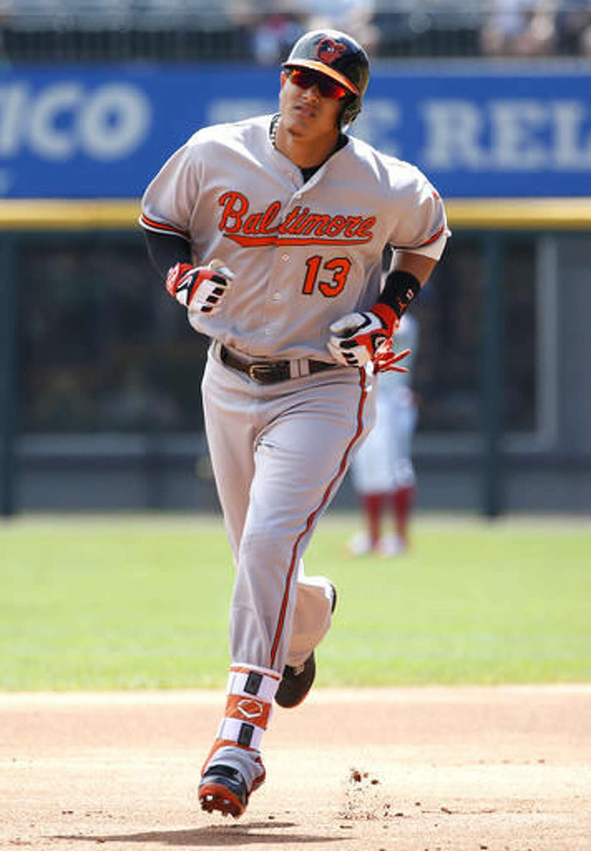 Baltimore Orioles' Manny Machado rounds the bases after hitting a two-run home run against the Chicago White Sox during the first inning of a baseball game in Chicago, Sunday, Aug. 7, 2016. (AP Photo/Nam Y. Huh)