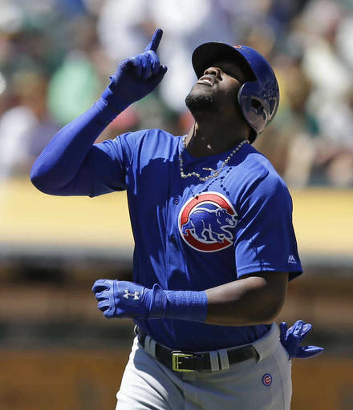 Chicago Cubs' Jorge Soler celebrates after hitting a home run off Oakland Athletics' Sean Manaea in the seventh inning of a baseball game Sunday, Aug. 7, 2016, in Oakland, Calif. (AP Photo/Ben Margot)