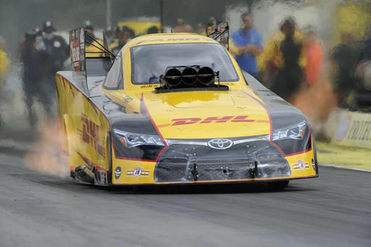 In this photo provided by NHRA, Del Worsham drives during Funny Car qualifying Saturday, Aug. 6, 2016, at the NHRA Northwest Nationals drag races at Pacific Raceways in Kent, Wash. Worsham had a time of 3.832 seconds at 330.88 mph in the fourth and final session. Worsham will face Tim Gibbons in the first round of eliminations Sunday. (Jerry Foss/NHRA via AP)