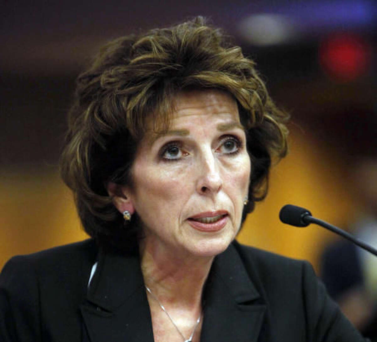 FILE - In this Dec. 14, 2011 file photo, University of California, Davis Chancellor Linda Katehi tells lawmakers that she never ordered campus police to use force or pepper spray on students, while testifying at a legislative hearing at the Capitol in Sacramento, Calif. The University of California announced that the embattled chancellor of UC Davis has resigned effective Tuesday, Aug. 9, 2016. University of California Chancellor Janet Napolitano said in a statement that the investigation found numerous instances where Katehi was not candid with her office, exercised poor judgment and violated university policies. (AP Photo/Rich Pedroncelli, File)