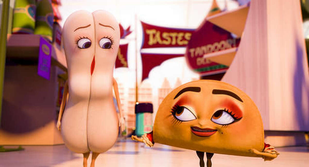 This image released by Sony Pictures shows Brenda, voiced by Kristen Wiig, left, and Teresa, voiced by Salma Hayek in a scene from "Sausage Party." (Columbia, Sony Pictures via AP)