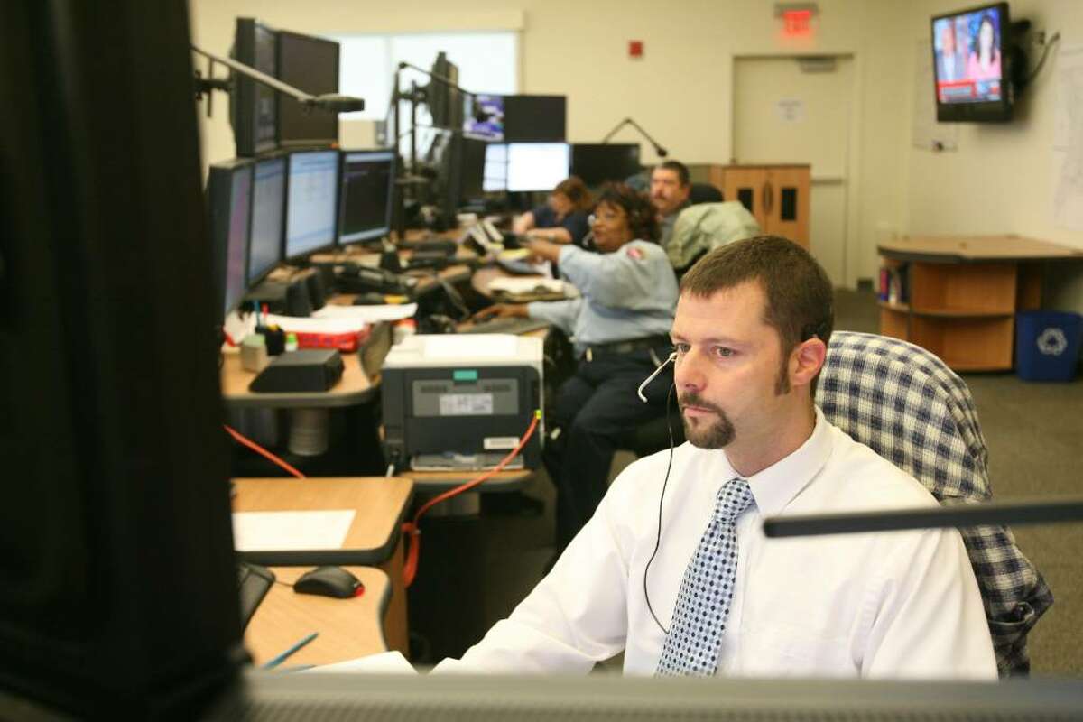 Supervisor Dave Lemelin watches the screens in Bridgeport's new Emergency Dispatch Center on Friday, April 30, 2010.