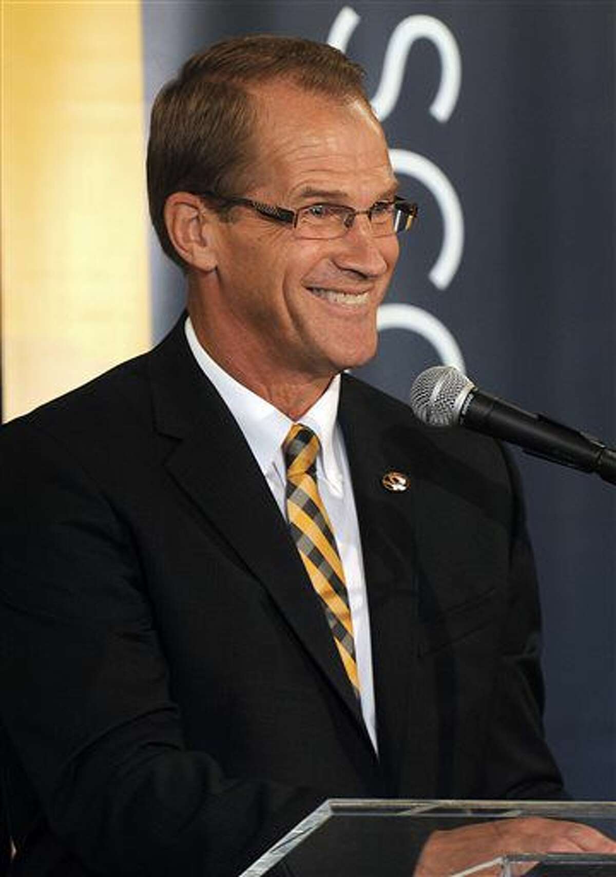 Newly-appointed University of Missouri athletic director Jim Sterk talks about accepting the position during a press conference, Thursday Aug. 11, 2016, at the Columns Club in Memorial Stadium in Columbia, Mo. (Don Shrubshell/Columbia Daily Tribune via AP)