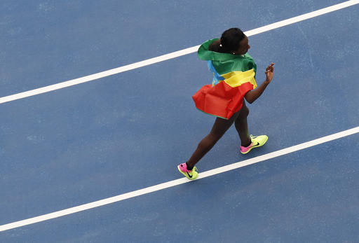 Ayana gets world record in opener of Olympic track program